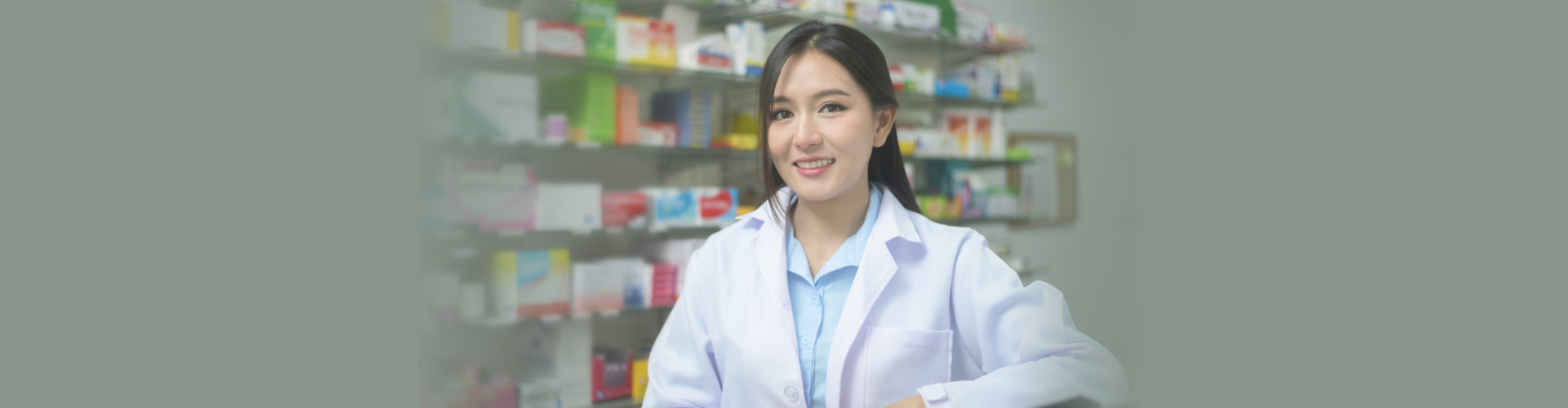 asian woman pharmacist wearing lab coat